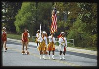 Photograph of women carrying flag during the 1976 ECU Homecoming parade